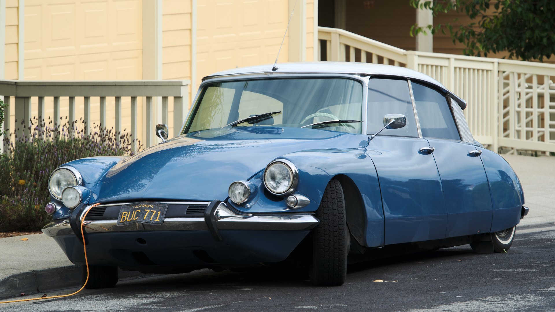 Blue and white Citroën DS parked on a San Francisco street