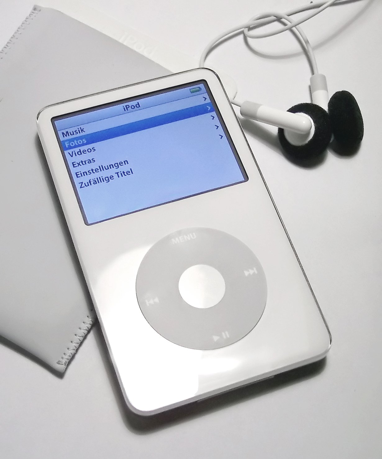 White fifth-generation iPod with click wheel, color screen, and earbuds