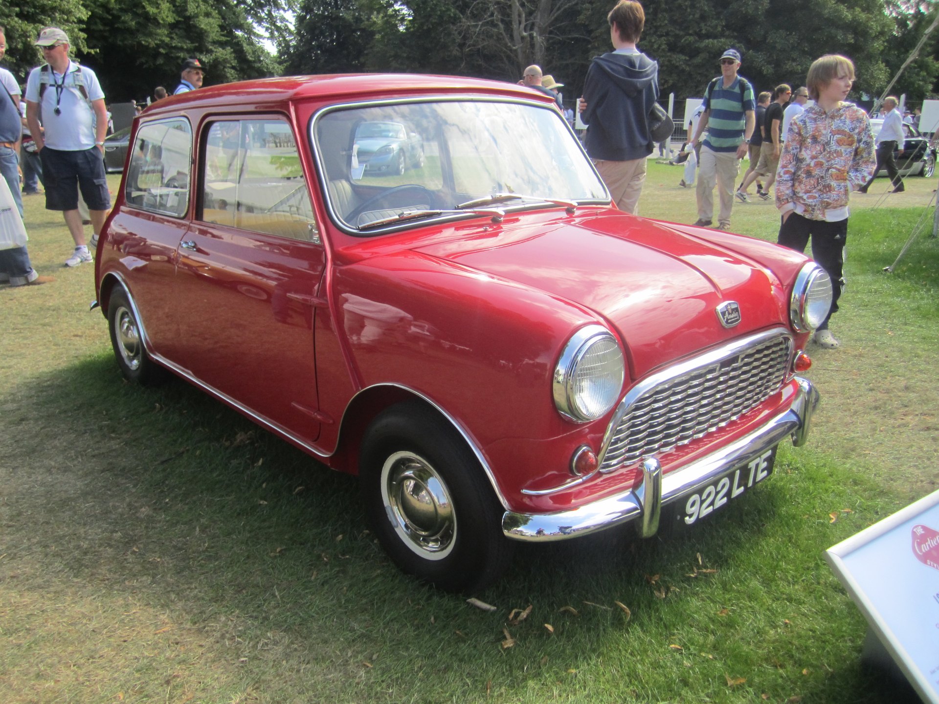 Red Austin Mini Mk I, 1959, chrome grille and ten-inch wheels