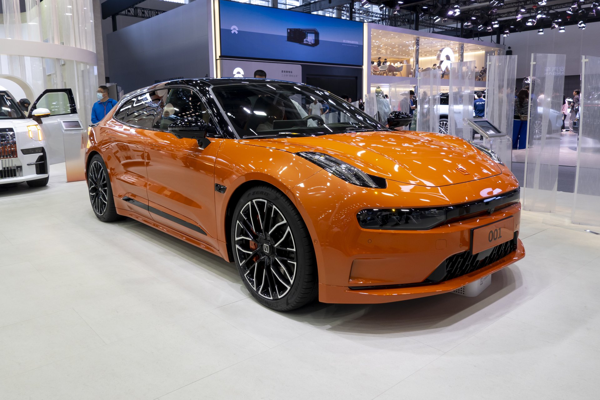 Zeekr 001 electric shooting brake on a motor show stand, long wheelbase and short overhangs